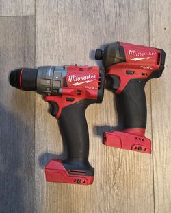Milwaukee M18 hammer drill and impact drill surge