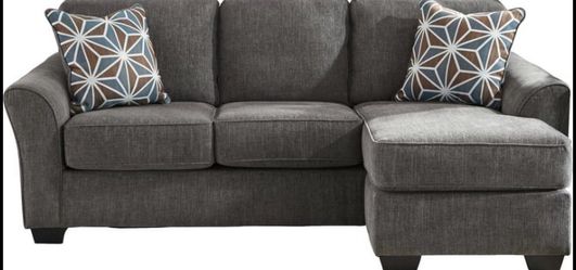 Year old sectional with reversible chaise