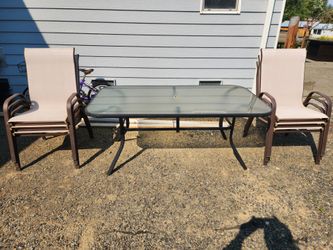 Patio glas  table and 6 chairs  $ 120