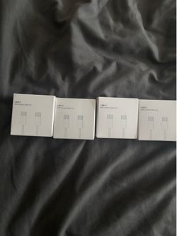 Four unopened USB c to C charging cables