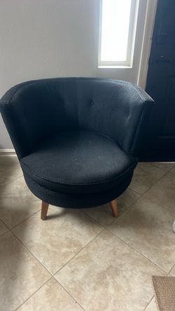 Two swivel black chairs