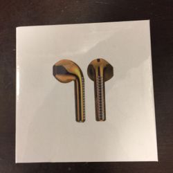 Stylish Metallic silver colored RoHS Wireless Earphones NEW in the box never opened Great Christmas Present