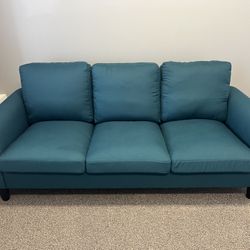 Teal Colored Sofa