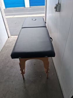 Massage table