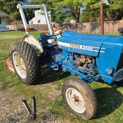 Ford tractor 2600 gas powered with bush hog