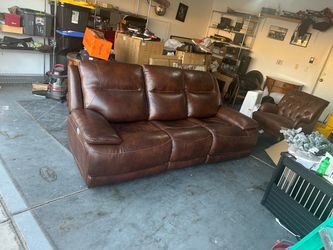 Dual electric recliner 8’ top grain leather couch very comfortable