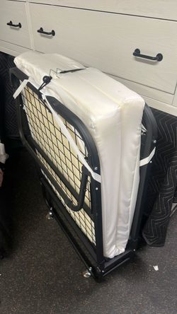 Roll away twin bed
