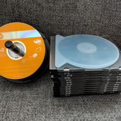 Brand new blank DVD +R (29) and CD cases (16)
