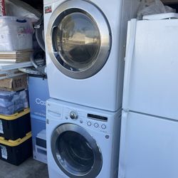 Lg Stackable Washer and gas dryer Excellent working condition W27 D31 H78 3 months warranty parts and labor only
