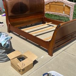 Broyhill Wood Sleigh Bed frame With Leather Back 