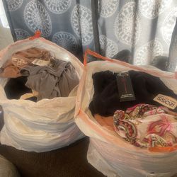 Bags Full Of Women’s Clothes 