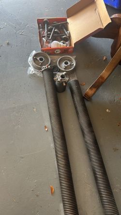 Overhead Garage Door Broken Spring Opener Off Track Adjustment Replace And Parts
