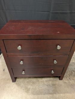 Compact Dark Wood Three-Drawer Chest