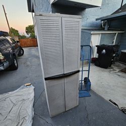 Black/Decker outdoor cabinet, has shelves, it has seen better days but can work for the right person