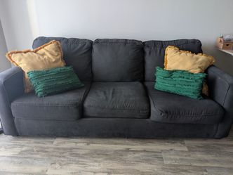 3 seater couch with a full size mattress