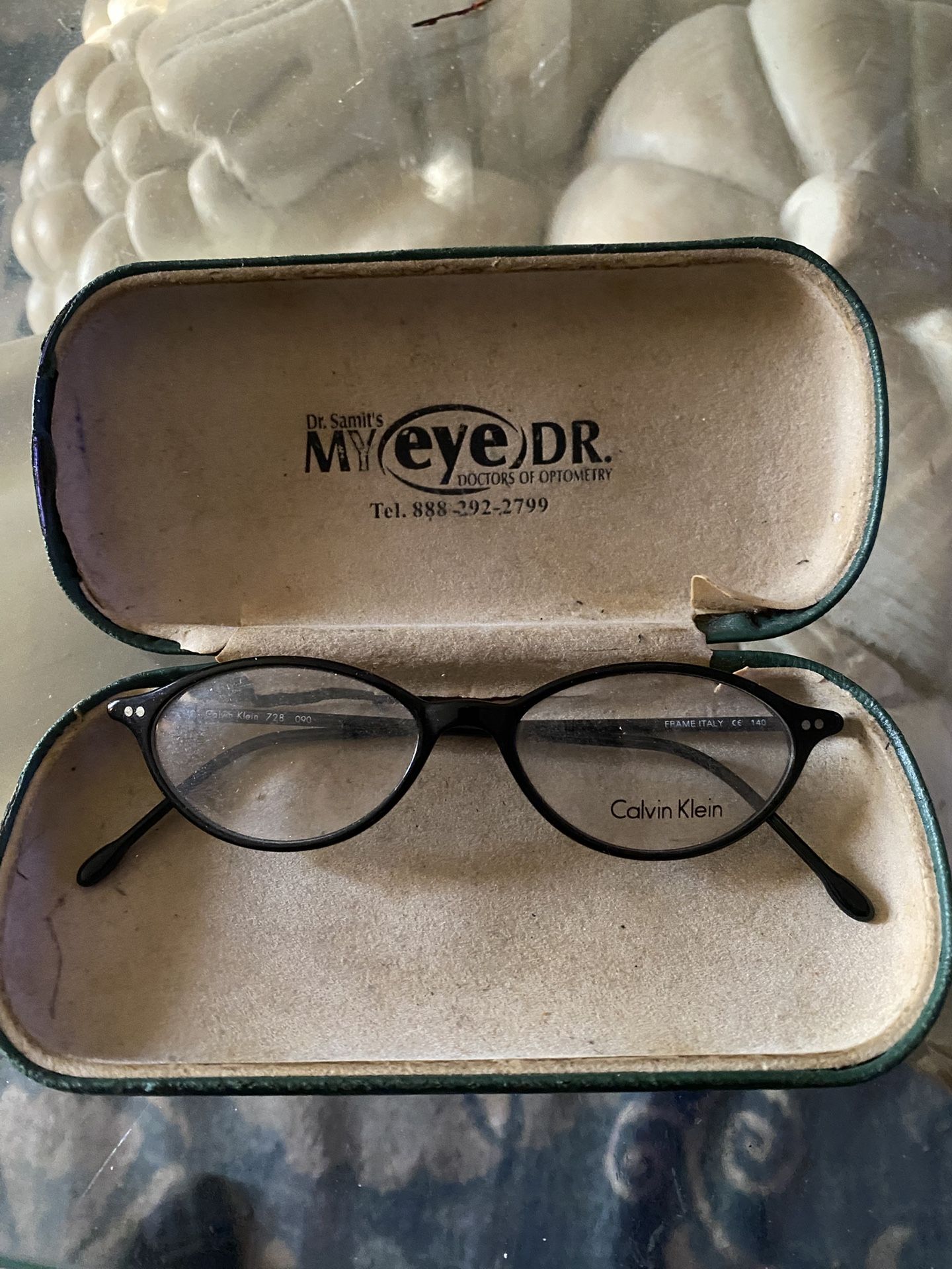 black Calvin Klein round frame glasses