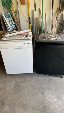 Two Dishwashers – White Whirlpool and Black GE