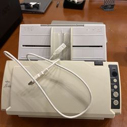 Fujitsu fi-6110 document scanner. It is a workgroup scanner designed for desktop use, featuring high-speed scanning and a compact desig