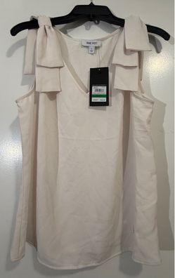 Cream Sleeveless V neck
