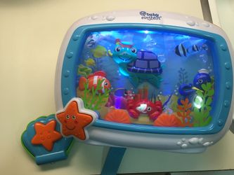 Like new baby Einstein crib soother, lights sounds and remote