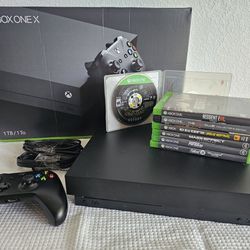 Xbox One X Like New Including Games