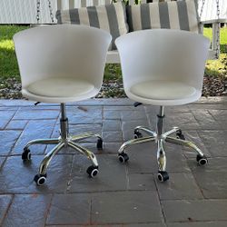 Rolling White Chairs 