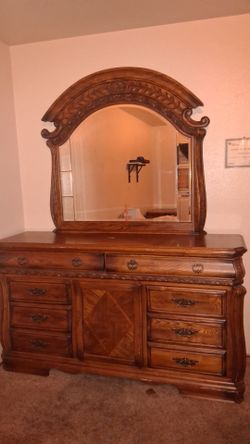 Solid oak larg dresser with beveled glass mirror,and night stands