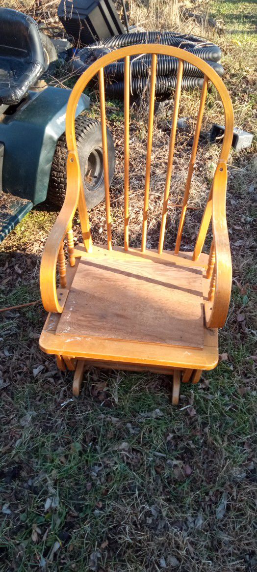 One Heavy Duty Wooden Rocking Chair
