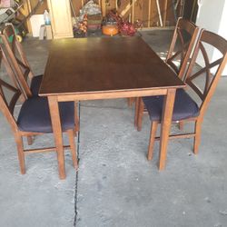 Table And 4 Chairs 