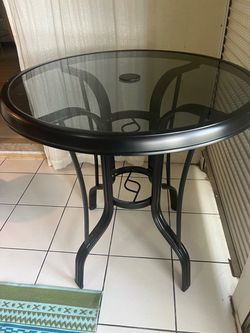 Black Wrought iron and glass round table