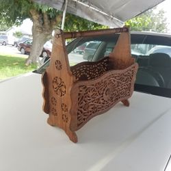 Hand carved magazine rack