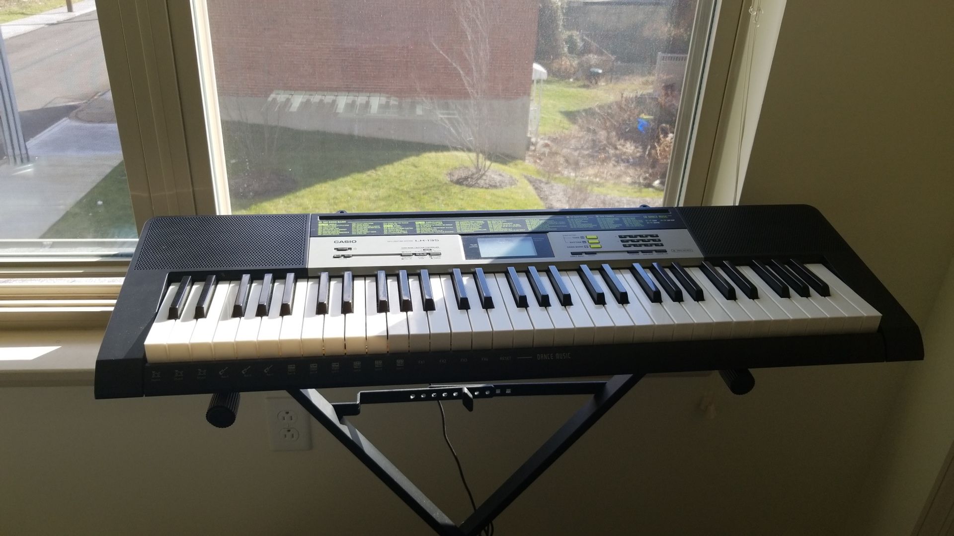 Casio keyboard and it's stand for $50