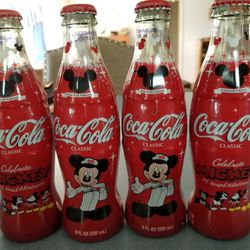 4 Collectable 2004 Disney's Mickey Mouse Coca Cola Bottles