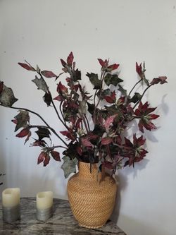 FLOWERS LOOK SO REAL  IN WEAKER BASKET  REAL NICE 