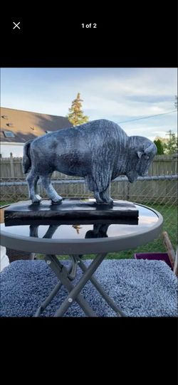 The old gray buffalo statue