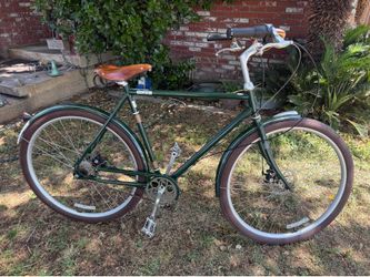 Raleigh Tourist classic city bike with a brown  leather saddle seat in great shape