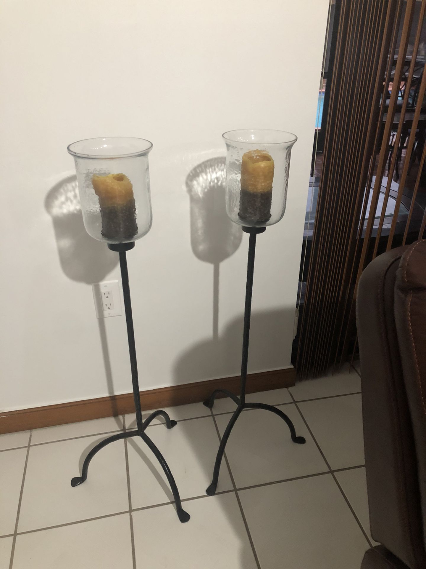 2 tall candle holders