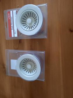 2 new almond sink strainers