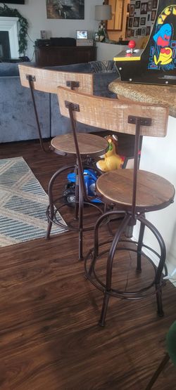 2 wooden adjustable bar stools