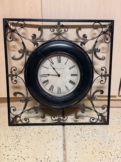 Black Buchanan clock with metallic accents