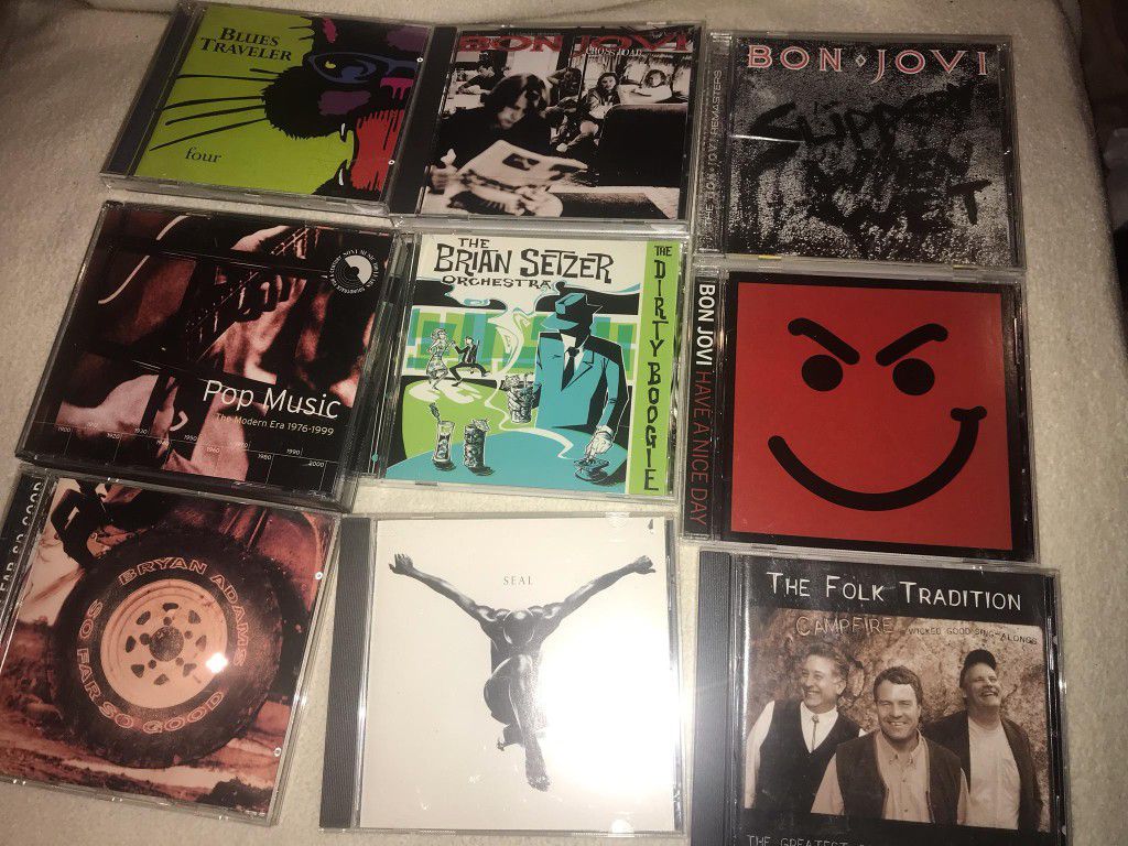 Nice estate lot of 18 used cds, very good overall condition , including several hot titles like 3x bon Jovi, Rihanna genesis Lynyrd Skyn