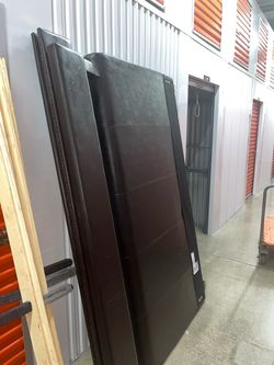 King Sized Dark Brown Leather Upholstered Headboard