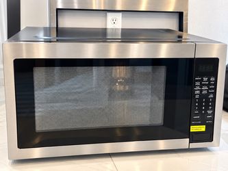 Whirlpool Brand New 24” Stainless Steel Microwave with 27” Trim Kit – Never Used