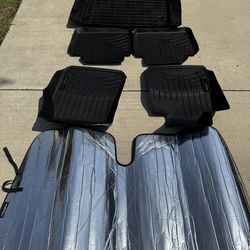 Preowned Weather tech floor mats, trunk Mat , and windshield Sunshade For 2014 BMW 320 I