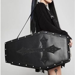 Coffin-shaped weekender bag