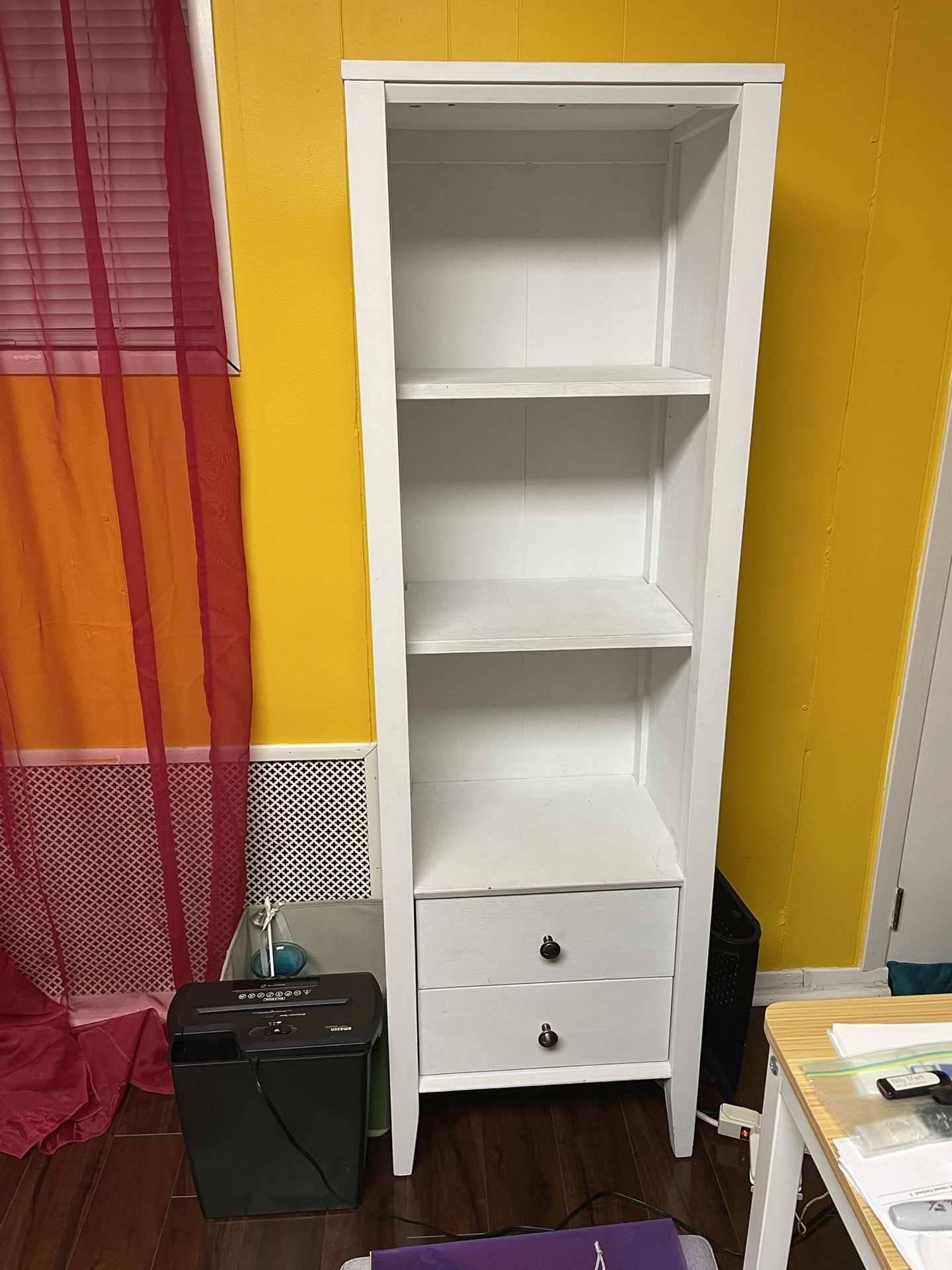 White bookcase with drawers