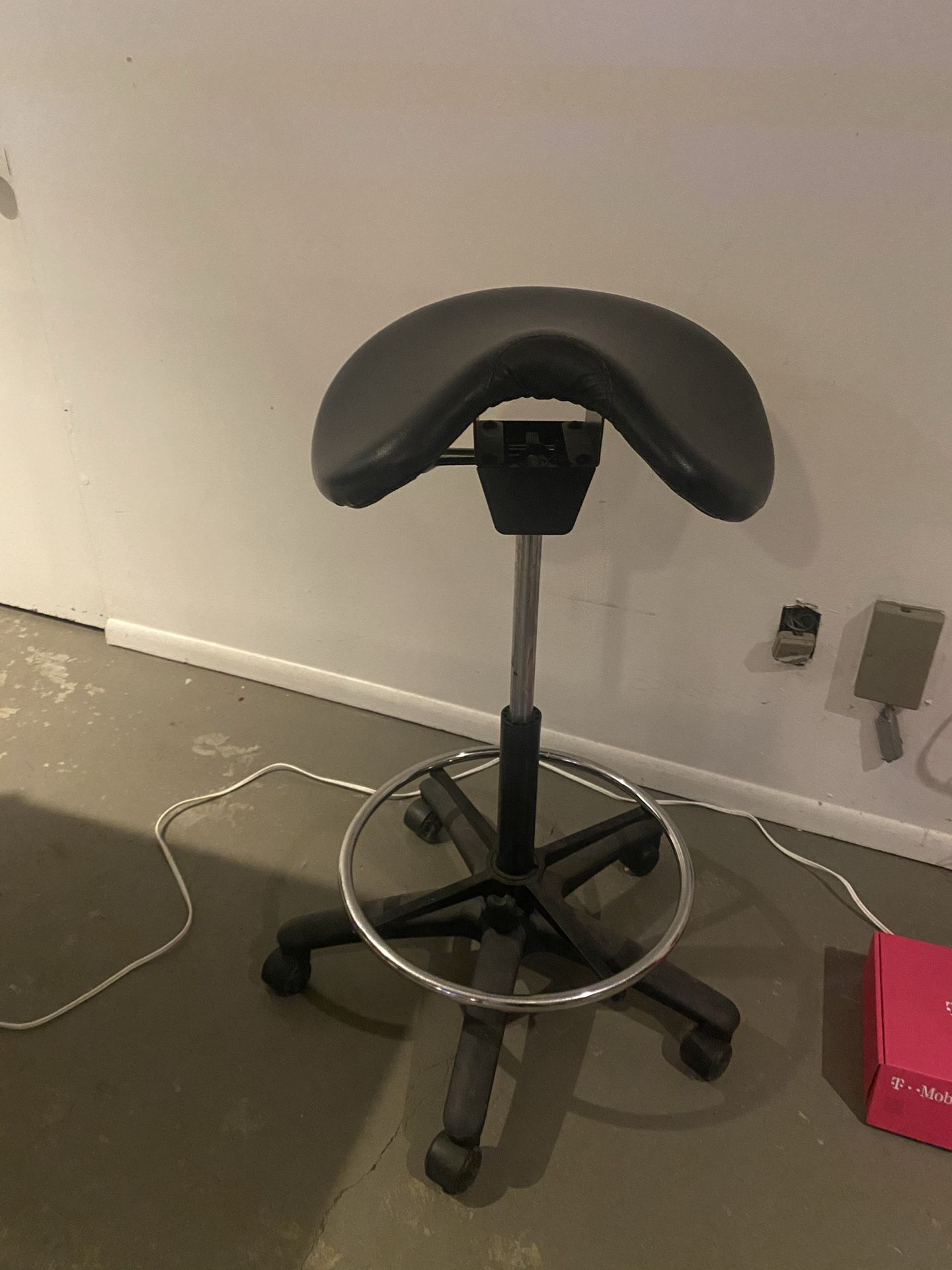 Rolling saddle stool, tall enough for stand up desk