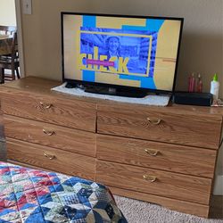 Six draw Dresser and TV works fine dresser in fair condition