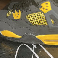 Air Jordan 4 Thunder Gos Black and Yellow