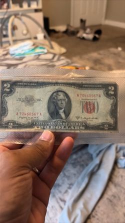Old currency and mint condition coins